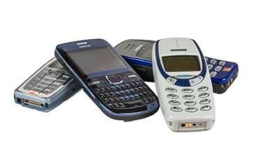 A selection of old cellphones that were used with the 2G GSM cellular system or wireless communications system