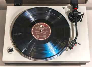 Example of a typical vinyl record player turntable - ai generated used until real ones come