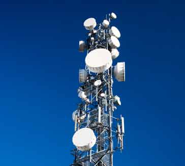Cellular telecommunications switching centre and base station antenna