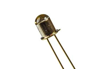 A typical phototransistor semiconductor device with lens to focus the light on the transistor - this electronic component has only has two leads as the base connection is often left open circuit and no external connection provided for use within the electronic circuit design.